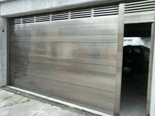 Portones de aluminio y vidrio en Cancún